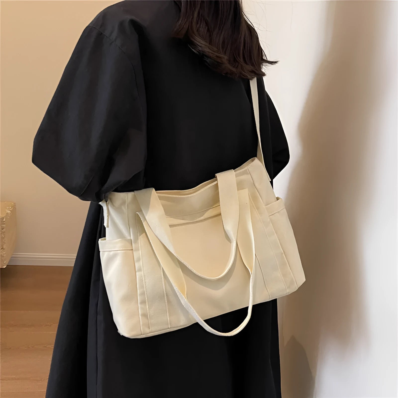 Large solid colour polyester shoulder tote bag with external pocket and internal phone compartment