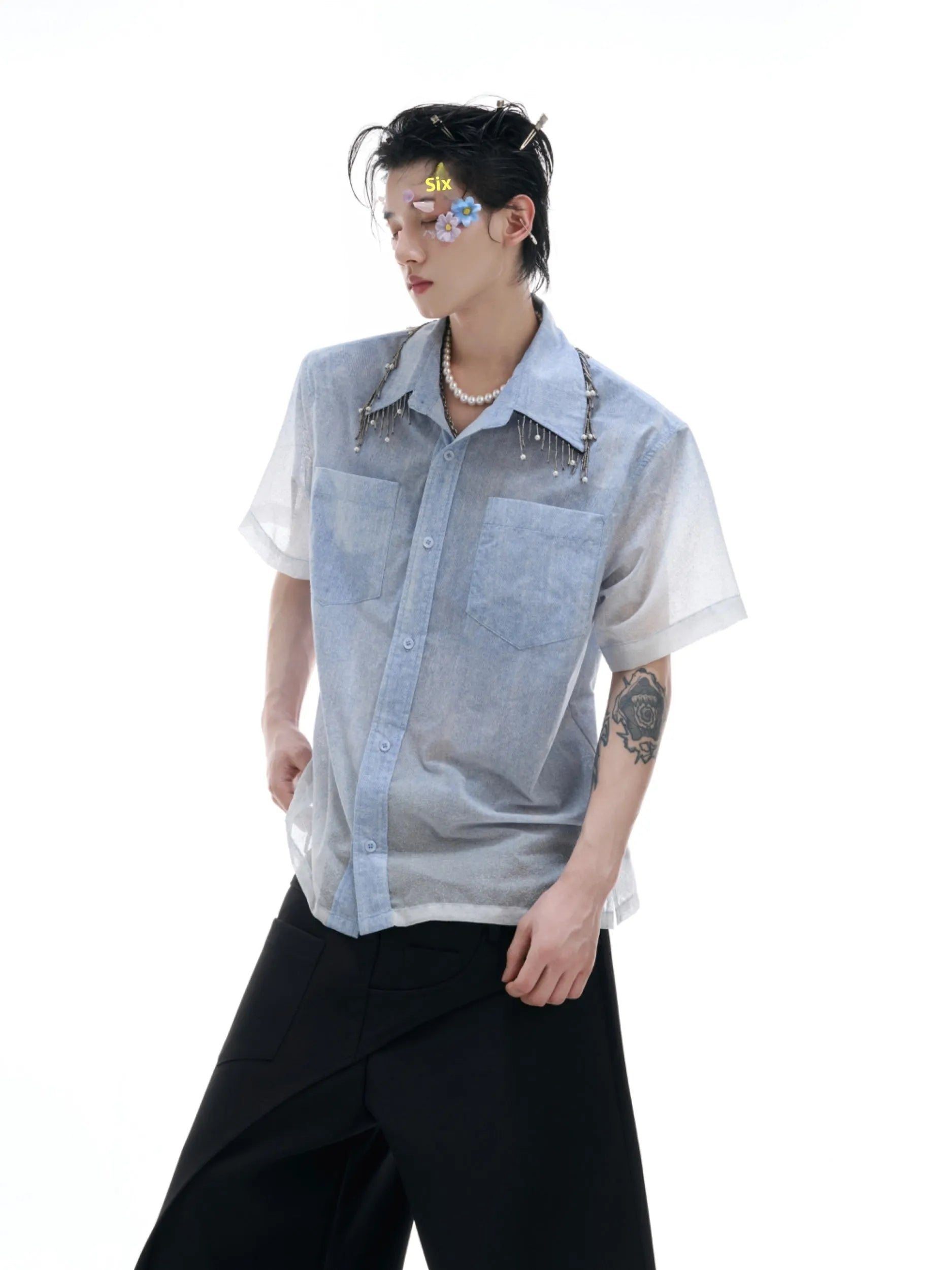 Man's blue and white gradient loose-fitting short sleeve casual shirt on a hanger