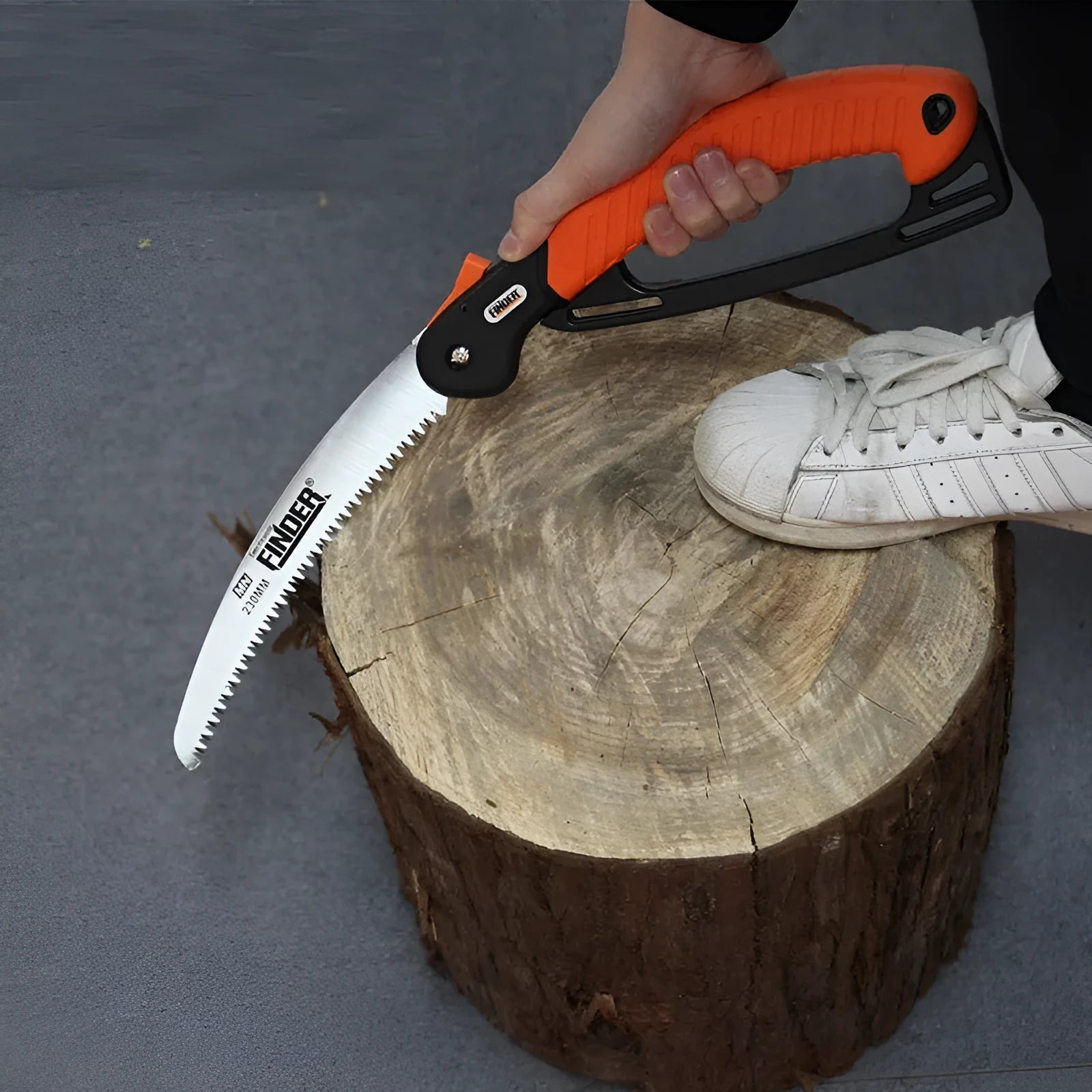 A folding hand saw with a 230mm blade and TPR handle, shown closed and open.