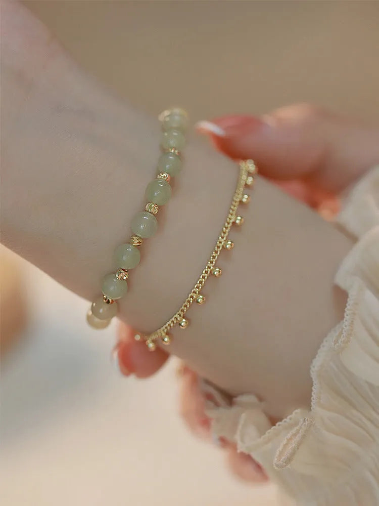 Handcrafted Hetian Jade bracelet with Princess On The Run beaded design for women