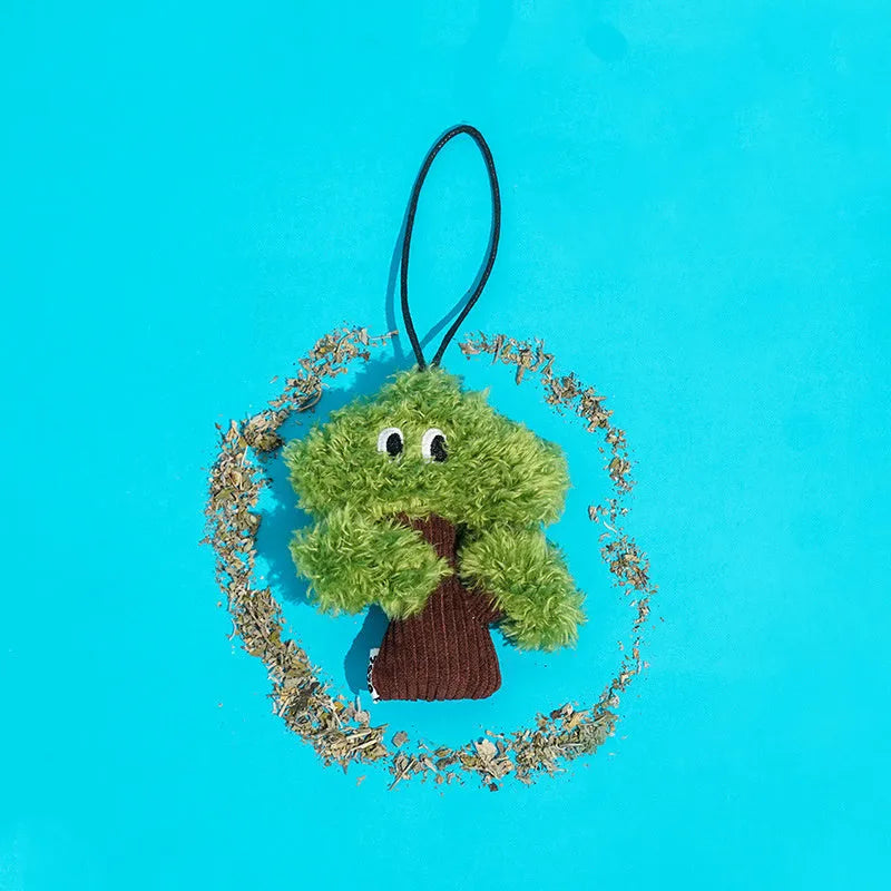 Pine tree shaped fabric cat toy pendant with catnip, shown in three sizes.