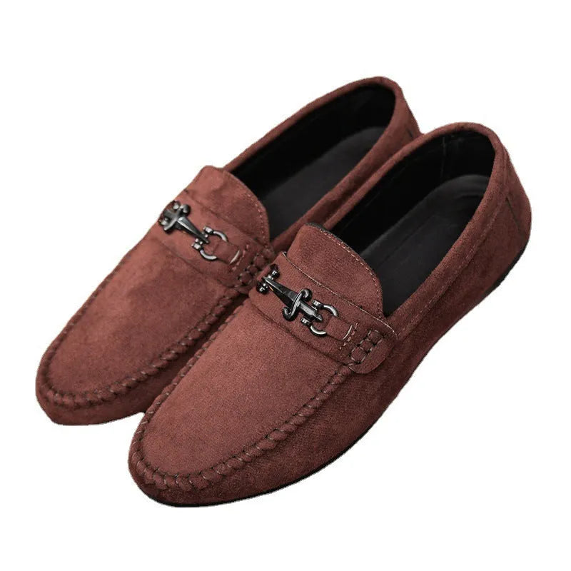 Men's black slip-on loafers with round toe and low stiletto heel, showing sewing thread detailing on artificial PU leather upper