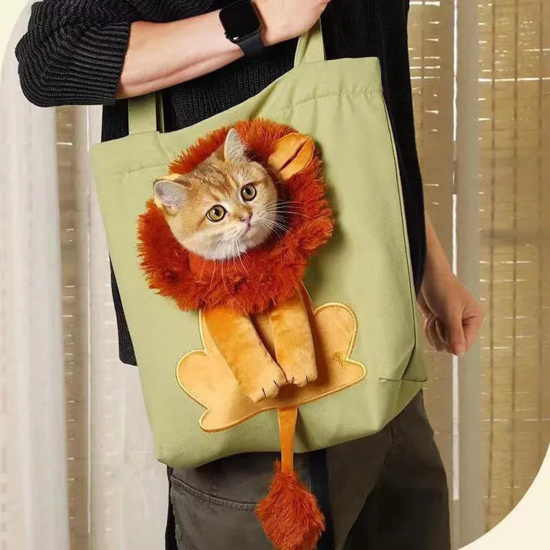 Soft canvas pet carrier shoulder bag for small cats and dogs in a cartoon pattern design.