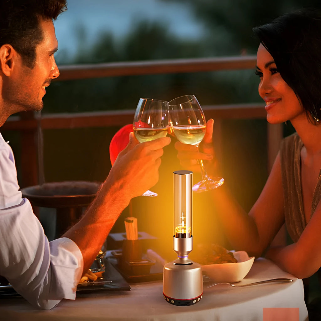 White silver candlelight Bluetooth speaker night light on a table.