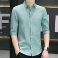 Men's slim-fit linen-blend half-sleeve shirt in light blue on a hanger.