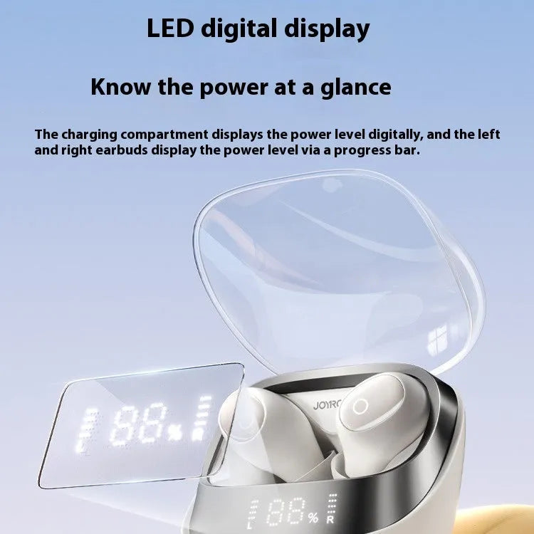 Beige wireless in-ear Bluetooth headphones with charging case on a table, showing USB Type-C port.