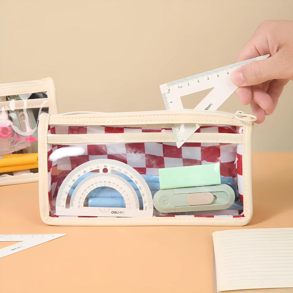 Large transparent PVC pencil case with internal black and white chessboard grid design.