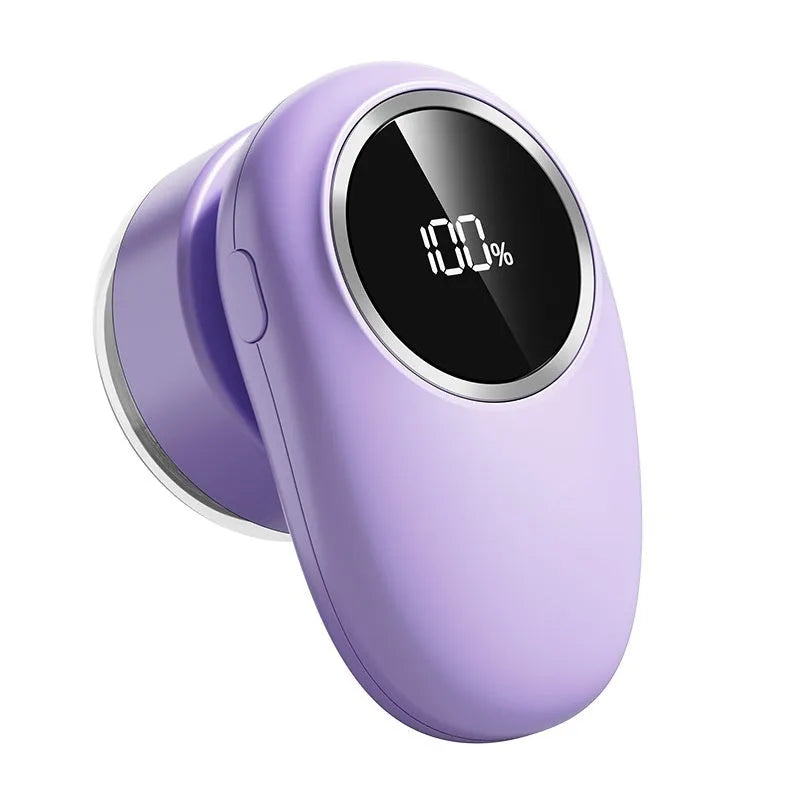Beige and purple digital fur ball trimmer lint removers with replacement cutter heads on a table.