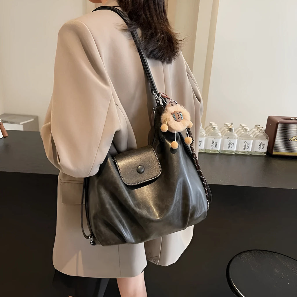 Large capacity PU leather single shoulder bag in black with internal mobile phone pocket