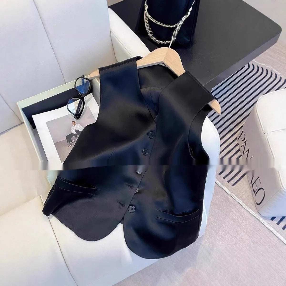 Black satin ladies' sleeveless vest with loose fit design and splicing detailing
