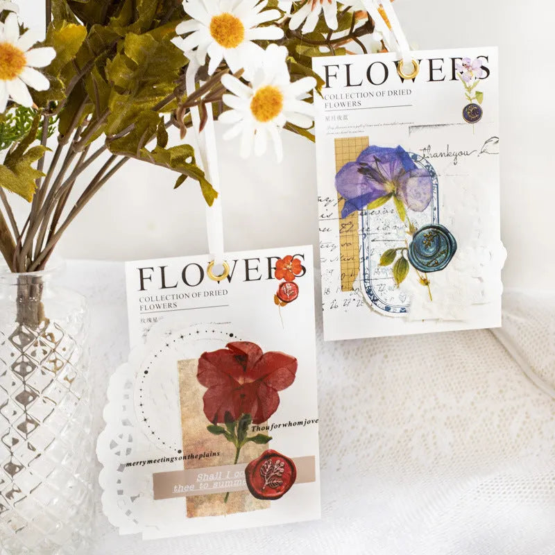 Square dried flower and fire paint design journal stickers in eight colour styles including purple, blue, orange, and pink.