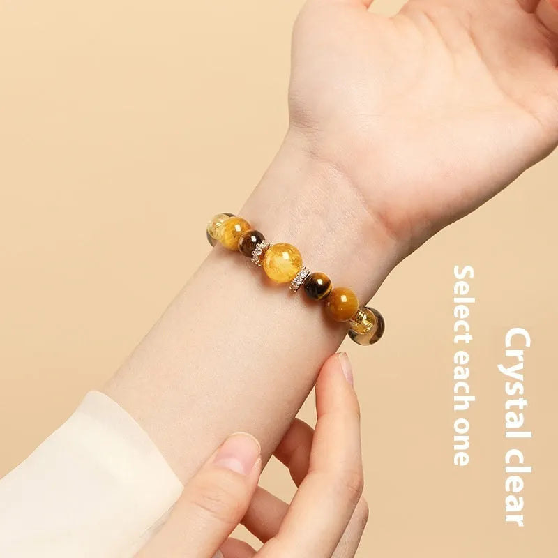 Lucky Jinba natural tiger-eye crystal bracelet with geometric beads in yellow tower style.