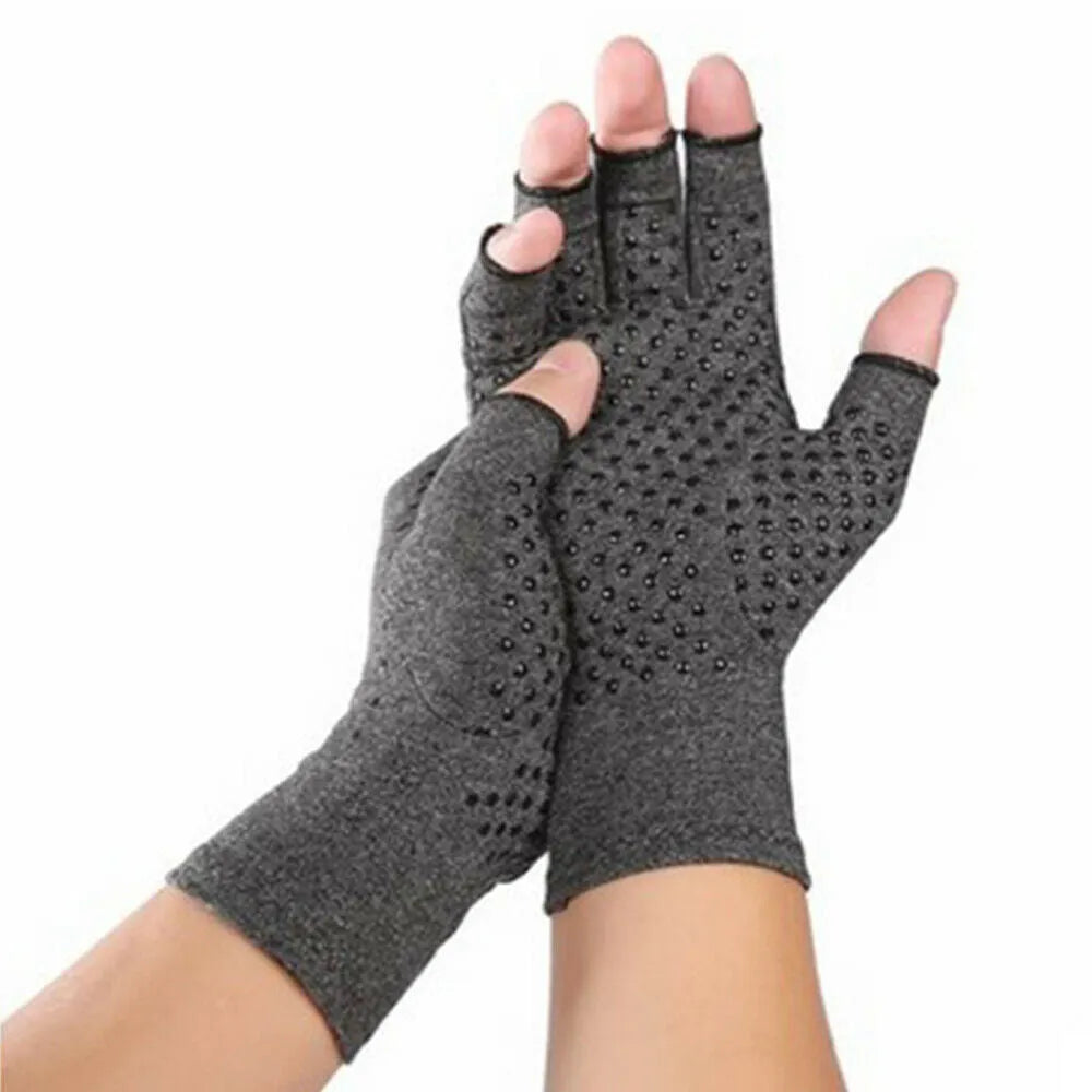 Grey half-finger joint compression gloves with an anti-slip palm pattern, shown laid flat.