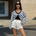 Striped long-sleeved cotton sweater shown wearable front and back, in black, pink, khaki, blue, or navy blue.