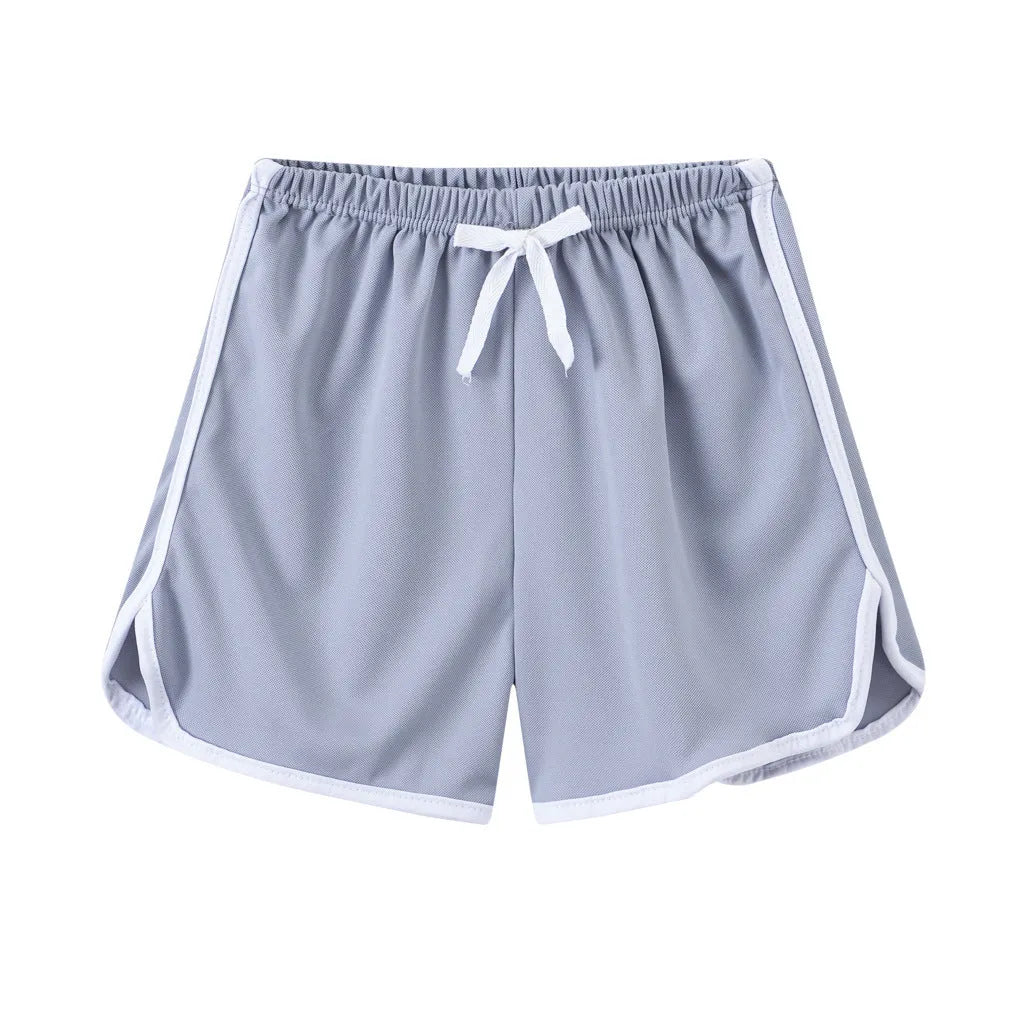 Children's polyester holiday shorts in multiple colours and patterns with height sizing from 100 to 140cm