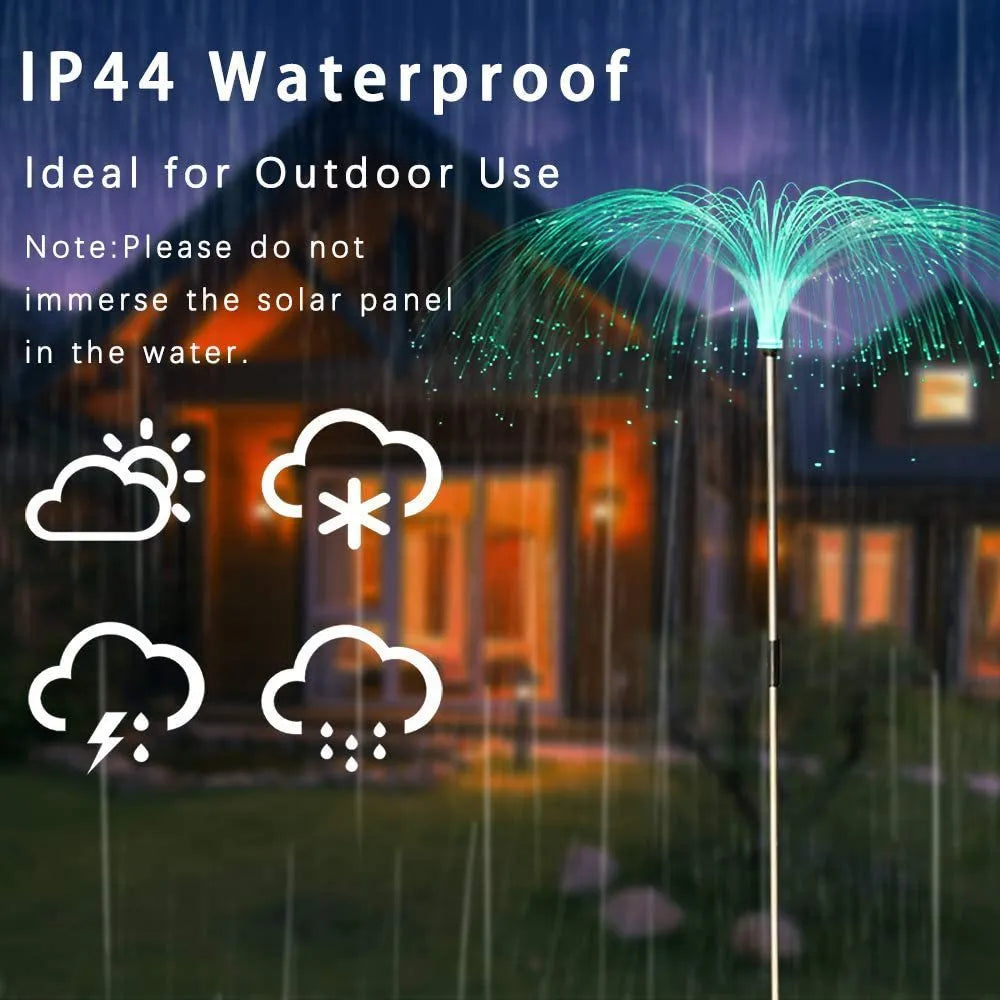 Solar fiber LED jellyfish ground light with remote control in a garden setting, IP44 outdoor decorative light