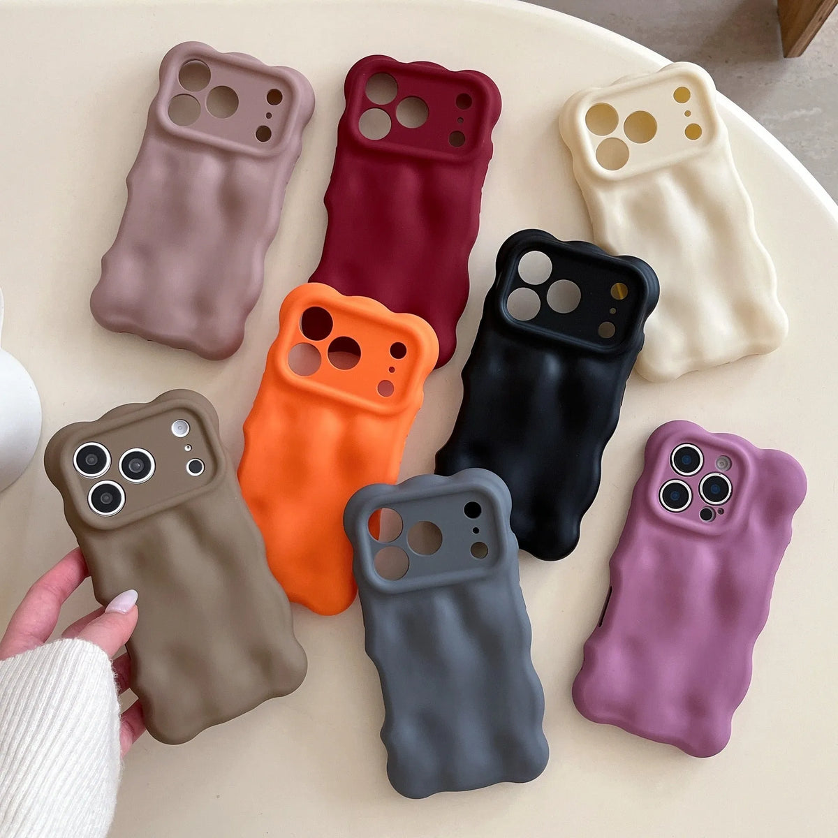 3D meteorite wave TPU phone case with frosted finish in khaki, pink, purple, wine red for iPhone 13 to 17 series