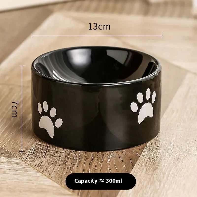 Ceramic cat food bowl with high foot and cat's paw print in chosen colour.