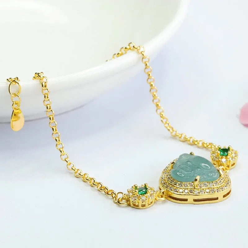 Emerald blue water jade bracelet with inlaid Maitreya Buddha design for women, measuring 10x13mm.