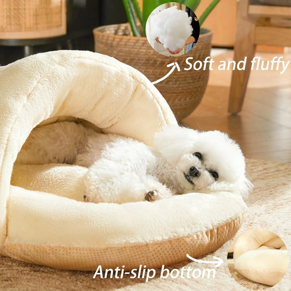 Grey slipper-shaped cat cave bed with plush lining on a wooden floor.