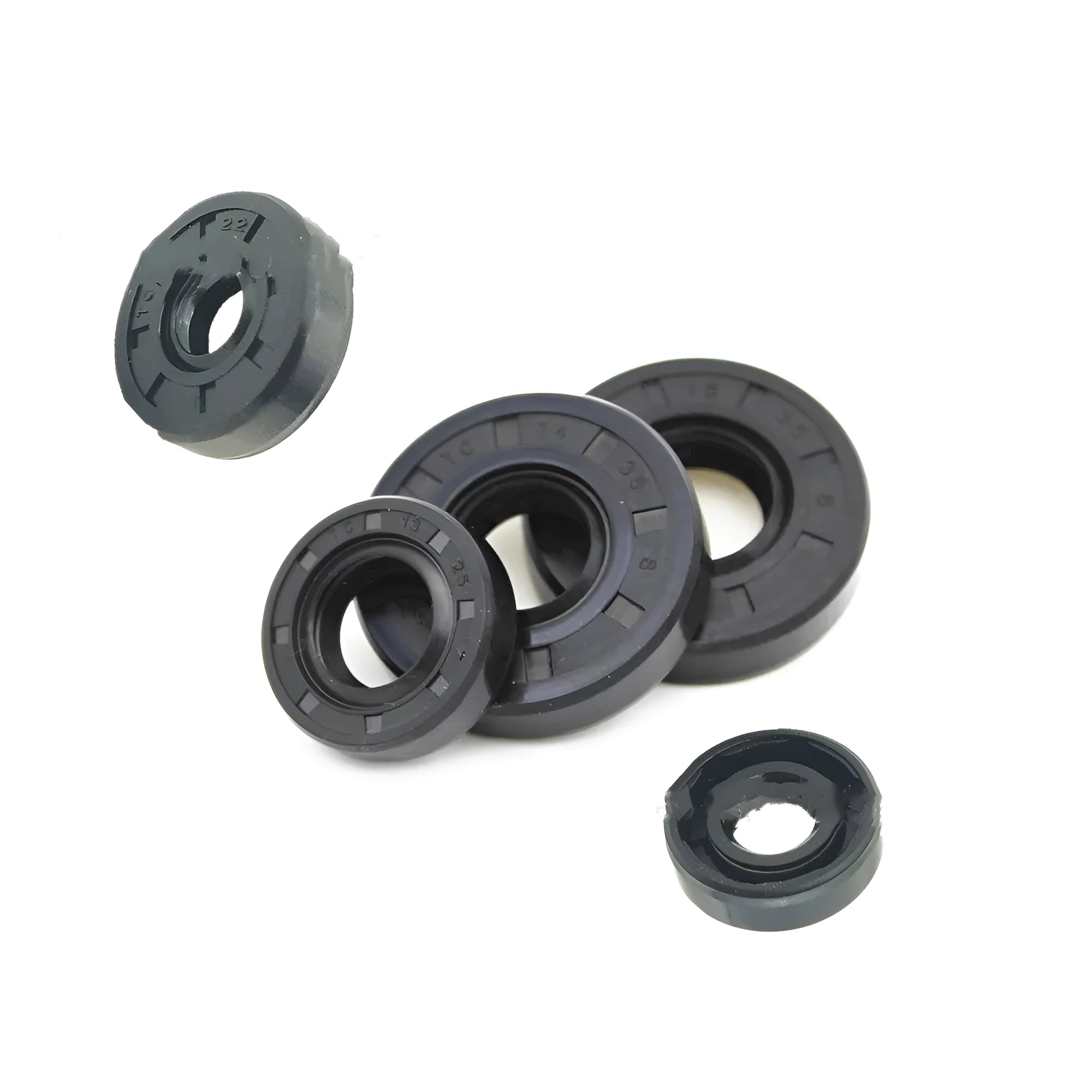 AG100 motorcycle oil seal kit with carbon steel frame and multiple rubber seal sizes from 7mm to 12mm thickness