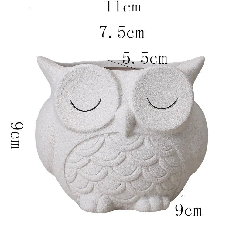 Handmade ceramic succulent pot with cartoon owl design in frosted pastel colour