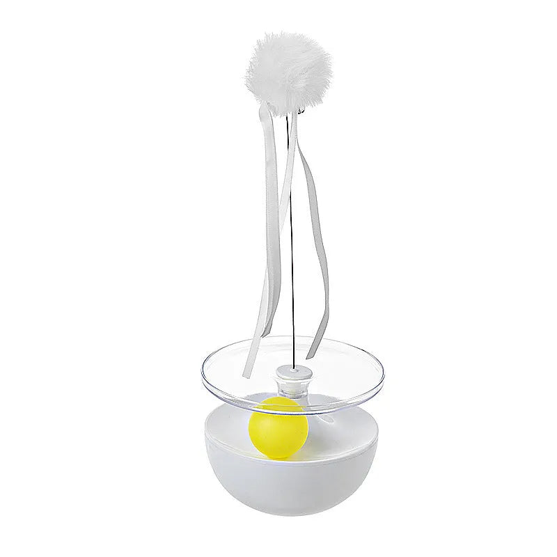 White tumbler cat toy with self-congratulating stick on a light floor