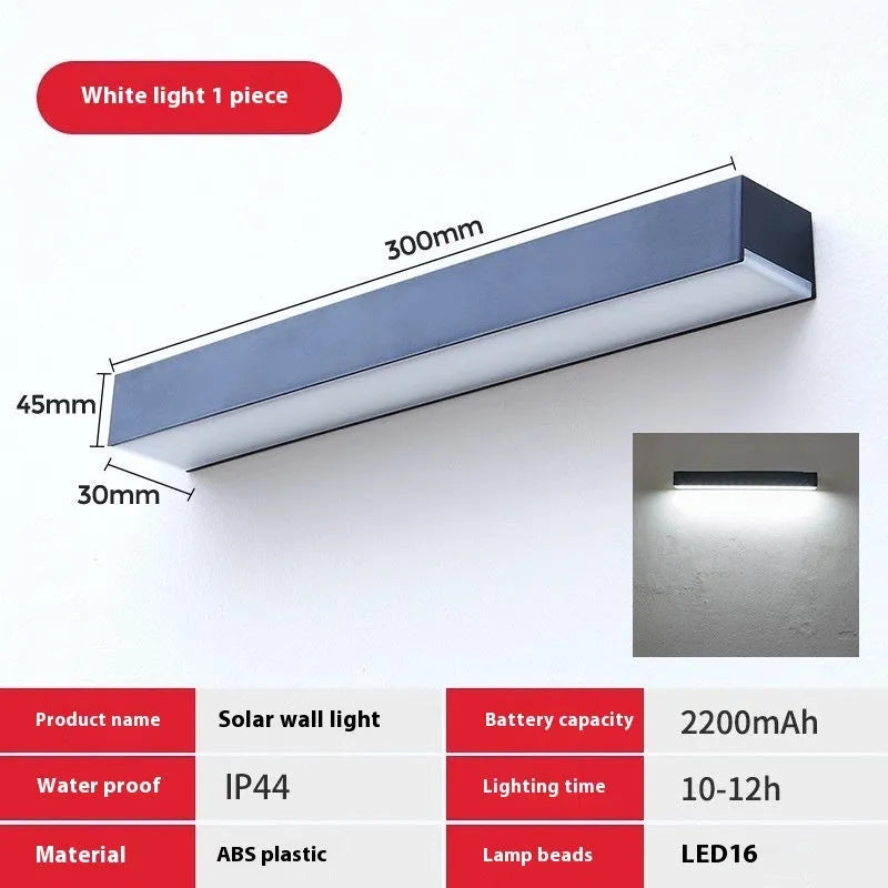 Black solar-powered outdoor wall lamp with integrated solar panel and LED light.