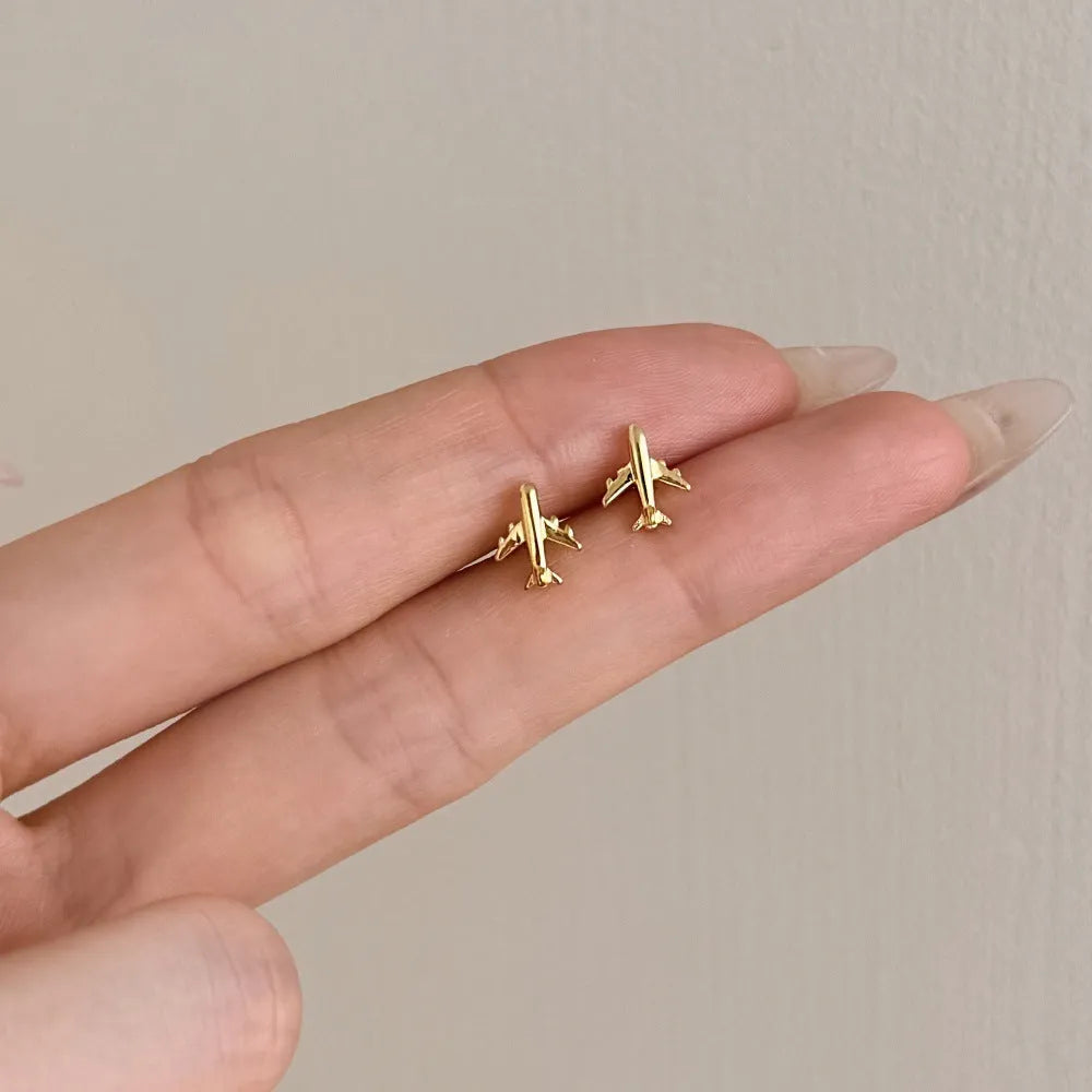 Pair of S925 sterling silver stud earrings with aircraft design in platinum finish