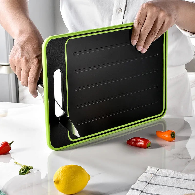 Grey square aluminium cutting board with double sides showing grinding teeth and built-in knife sharpener