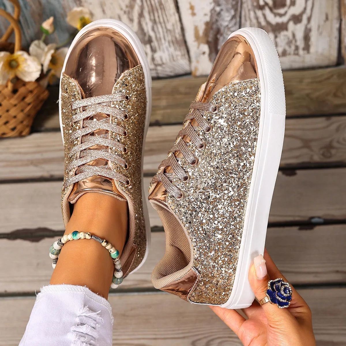 Women's plus size black sequined lace-up board shoes with flat rubber sole.
