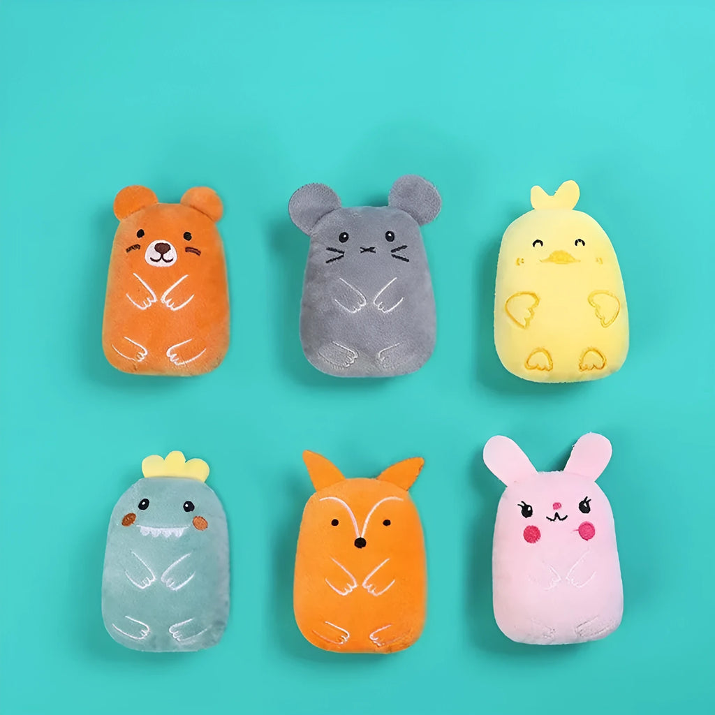 Set of four small coloured plush cat chew toys with catnip, shown next to a measuring tape indicating 11 cm length.