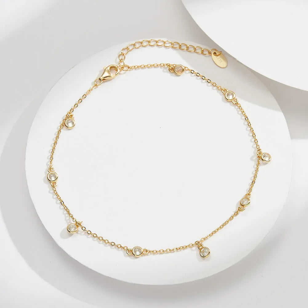 Women's silver anklet with geometric pendant containing zirconium stone in gold or white gold finish