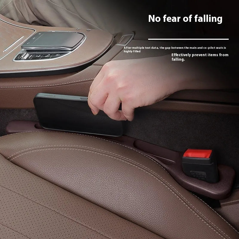 Black car seat gap filler installed between driver seat and centre console with leak-proof waterproof material