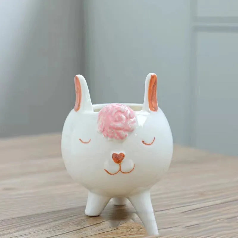 Hand painted ceramic succulent flowerpot with cartoon animal design in pastoral style.