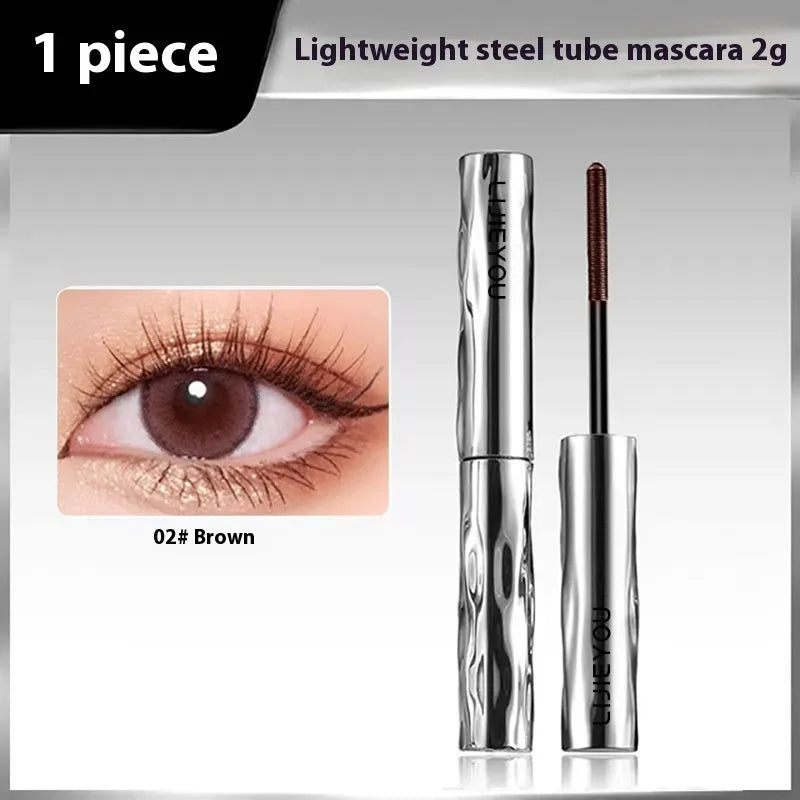 Steel tube waterproof mascara with applicator and optional eyelash curler in black or brown