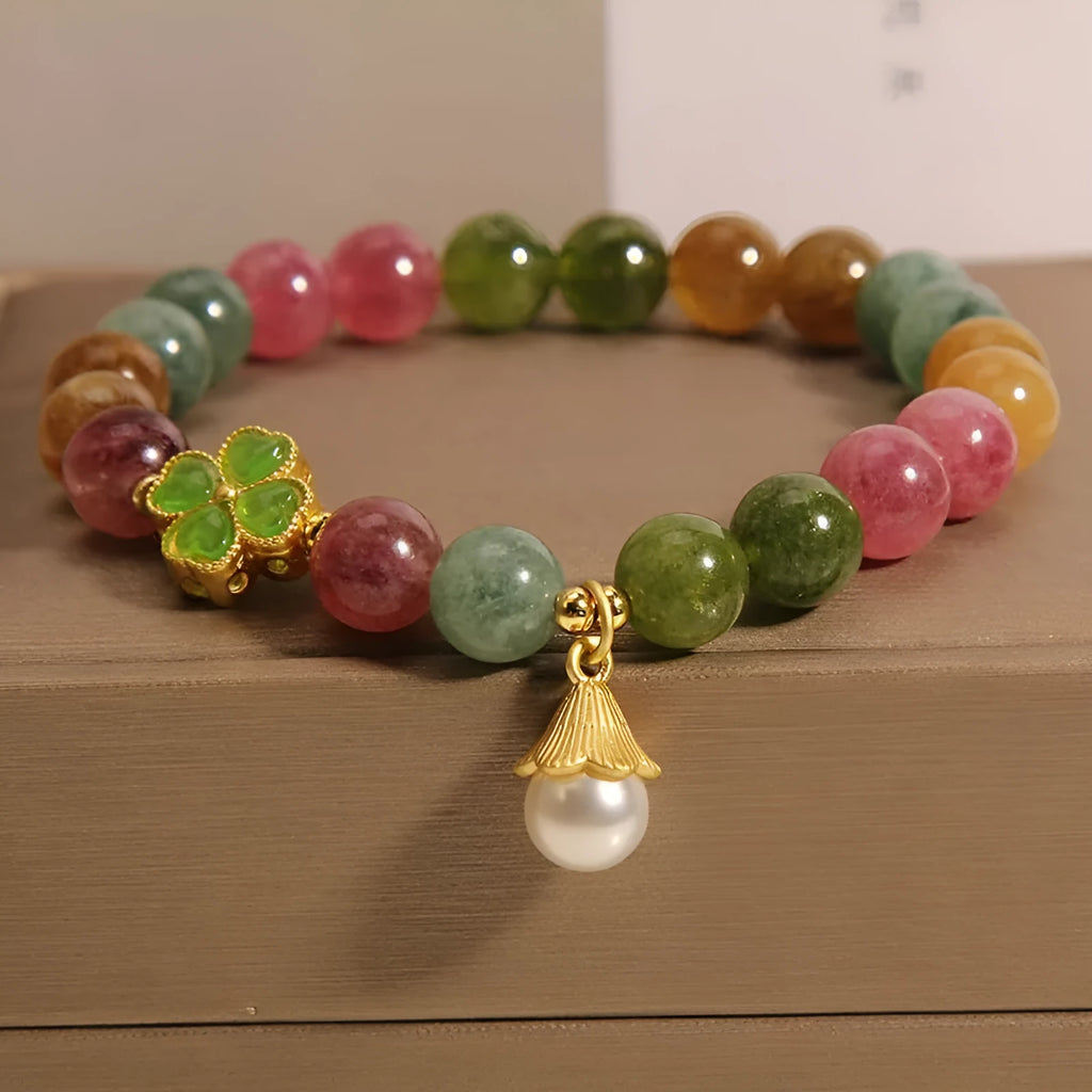 Colourful tourmaline bracelet with four-leaf clover pearl pendant in geometric drop shape