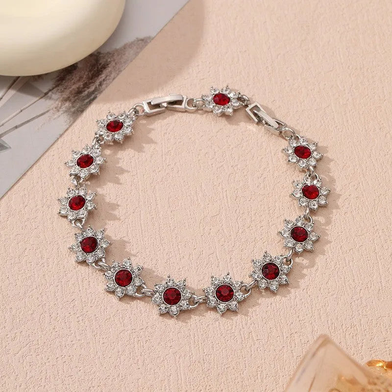Zinc alloy electroplated flower bracelet with colourful crystal designs on wrist