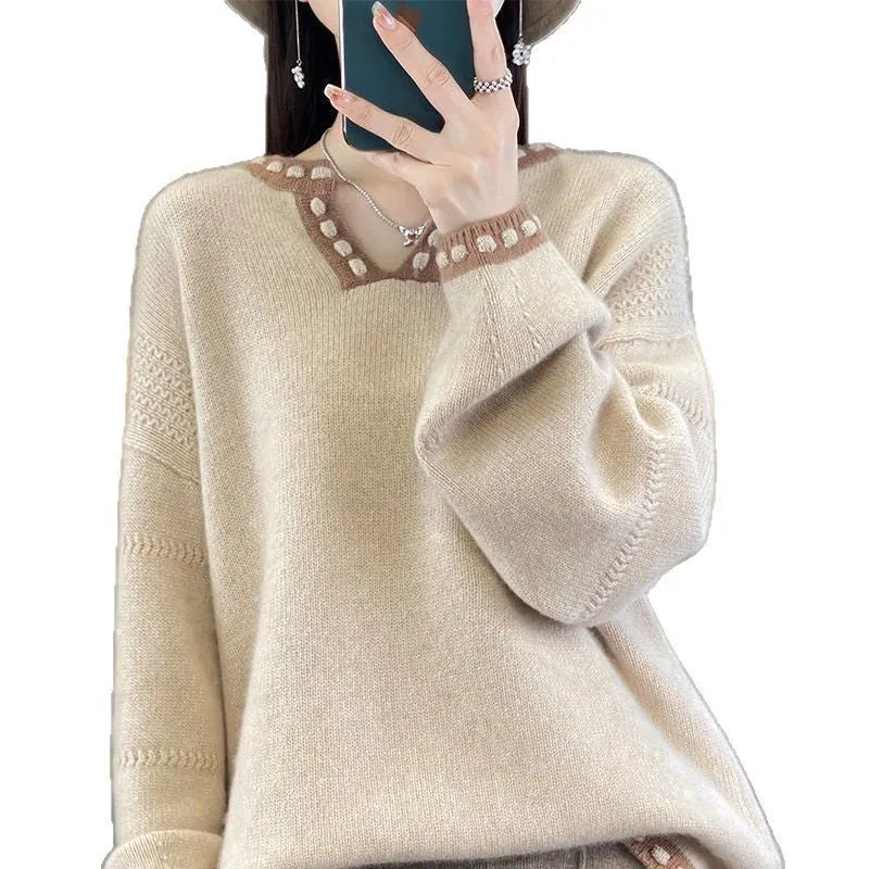 Women's white V-neck viscose pullover sweater showing long sleeves and regular fit.