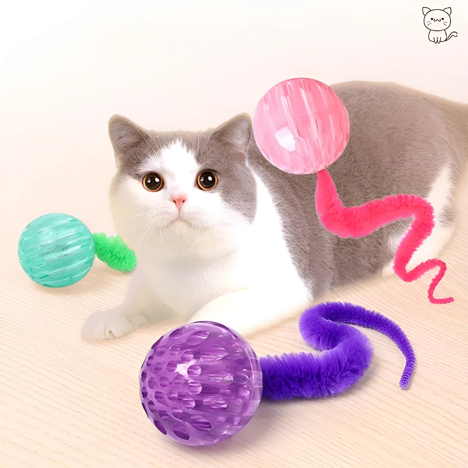TPR interactive cat ball toy with attached worm tail in green, pink or purple colours