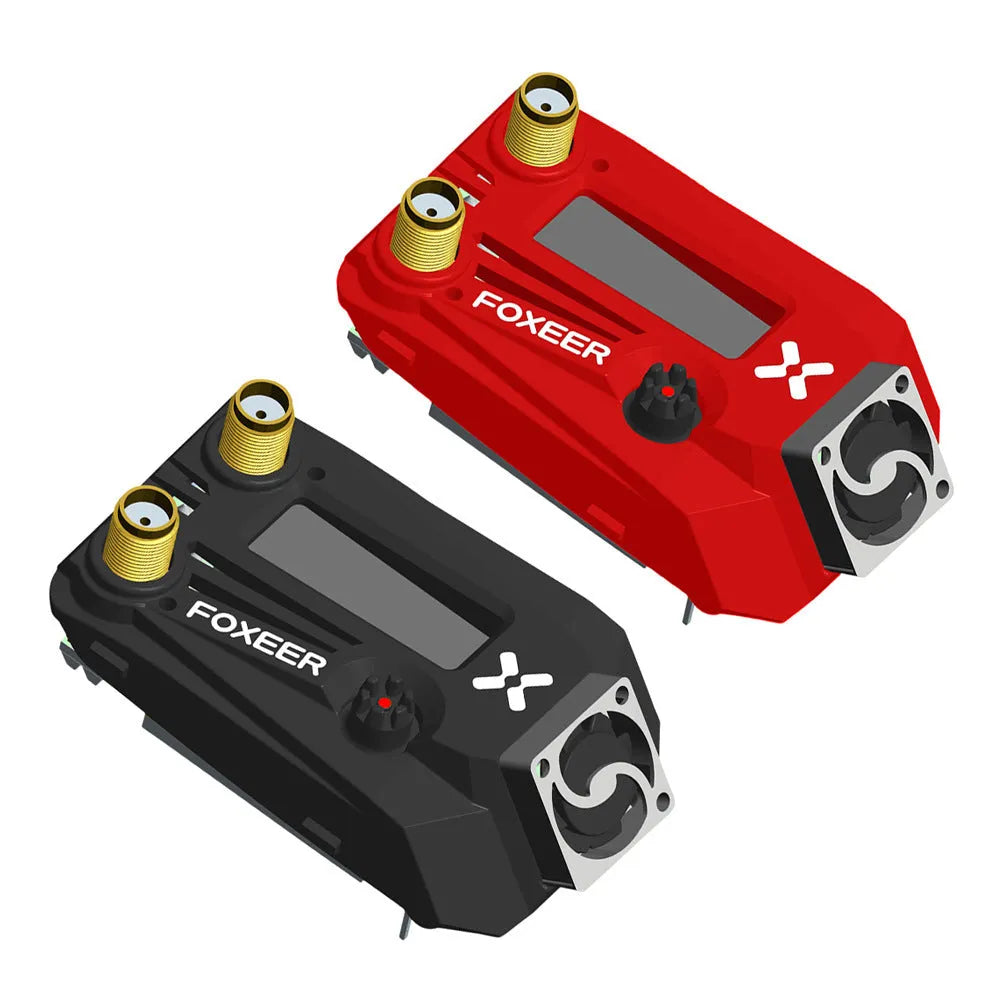 Black Wildfire FPV glasses with dual receivers, shown on a table, compatible with Fatshark drone systems.