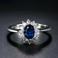 Sapphire blue moissanite floral women's ring made from electroplated copper.