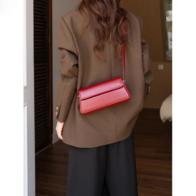 Red genuine two-layer cowhide leather shoulder messenger bag, 24.5x7x12.5cm horizontal square clamshell crossbody with zipper compartments
