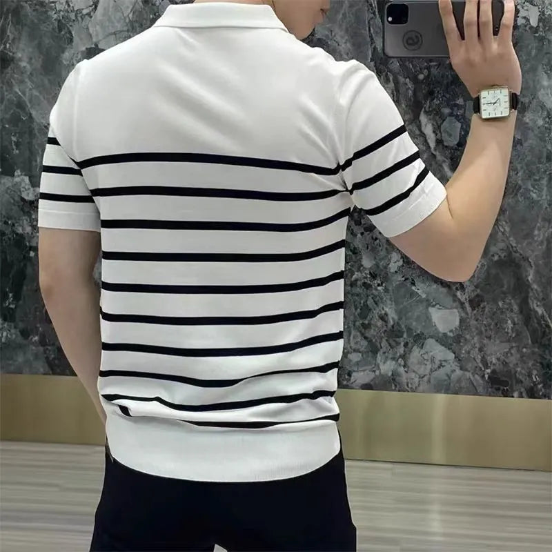 Men's black and white striped lapel V-neck long sleeve knitted T-shirt on a hanger.