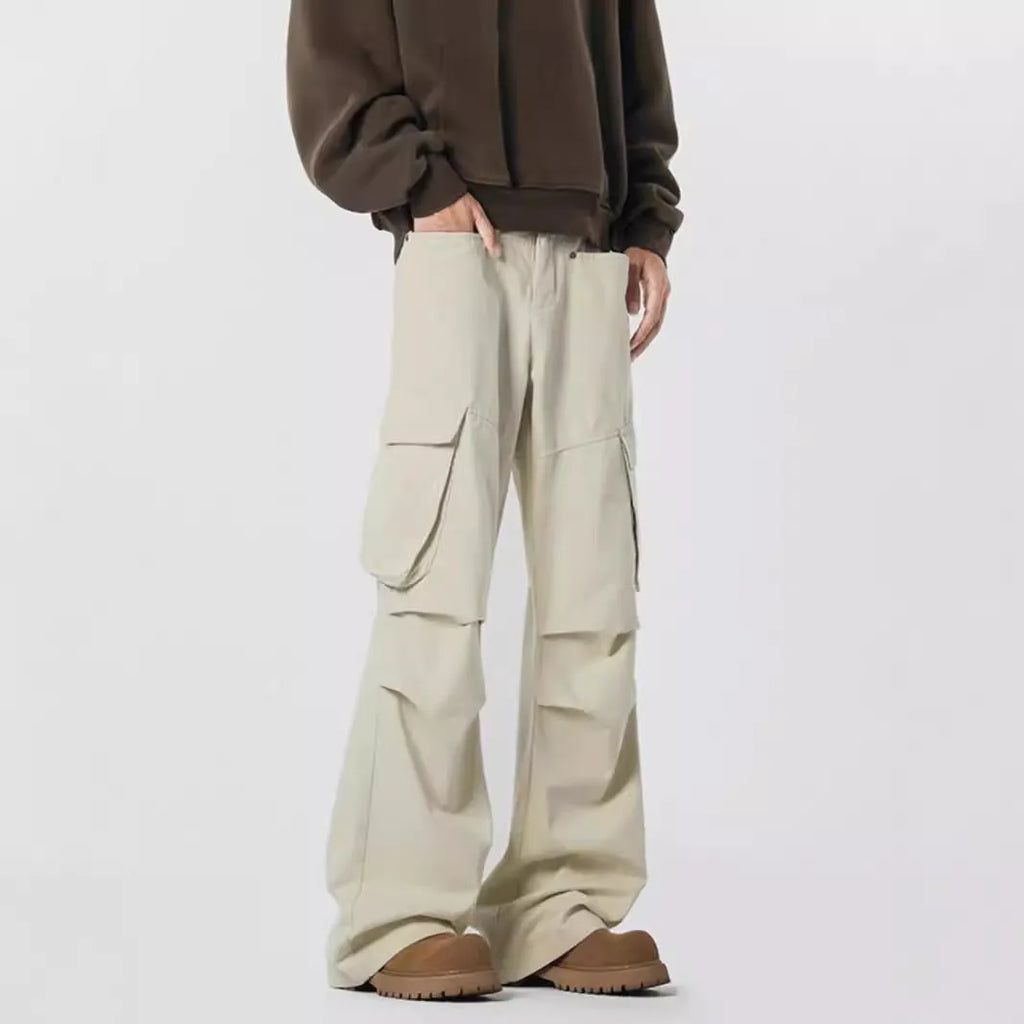 Men's beige straight-leg casual trousers with a high waist and button-fly front on a neutral background.