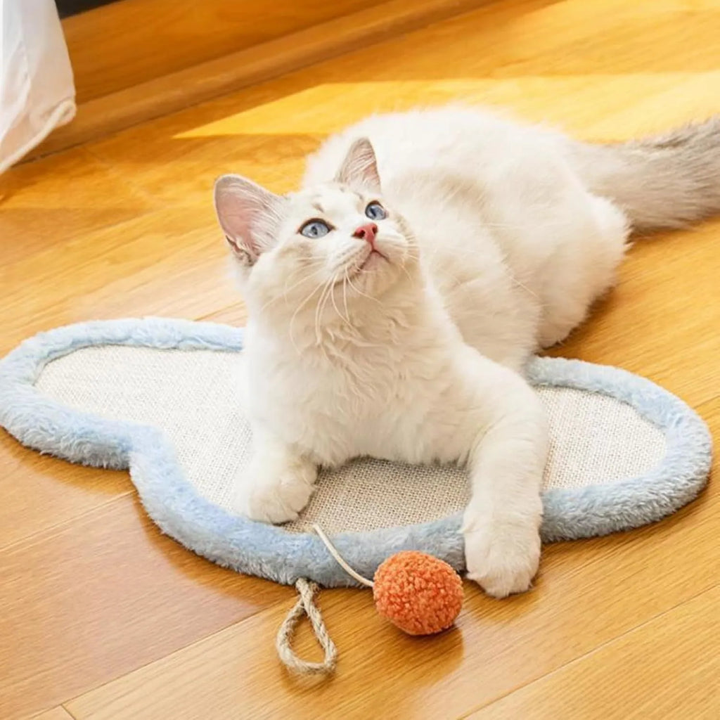 White wall-mounted cat scratching mat with cartoon sleeping cat design made from natural sisal fibre