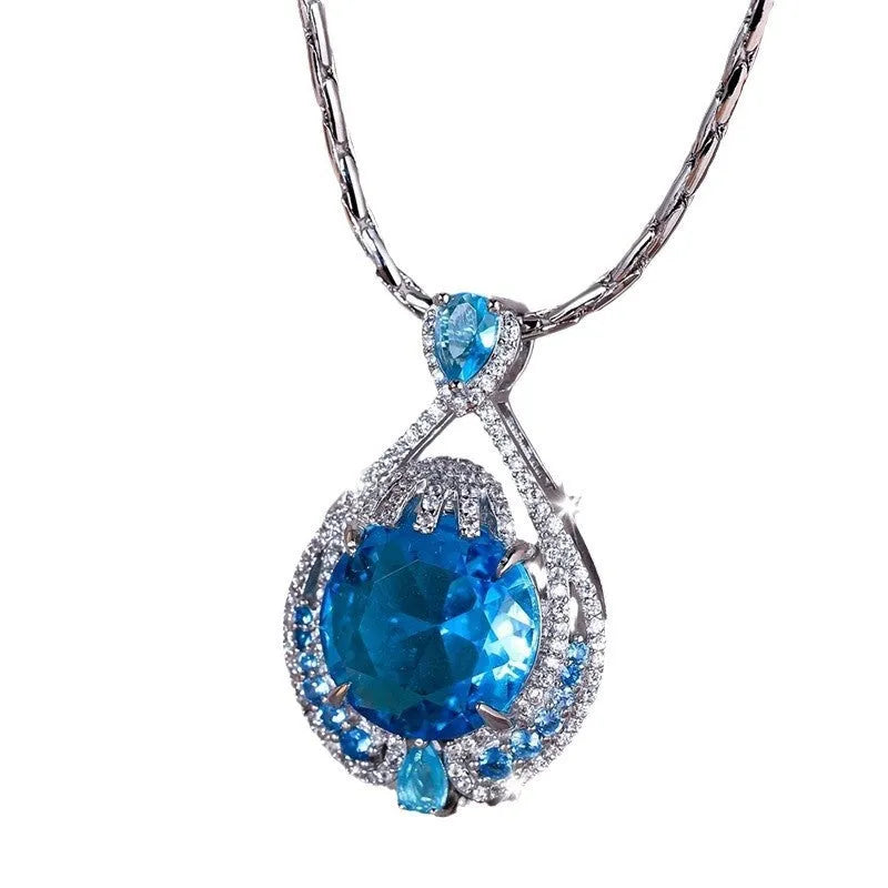 Women's blue crystal geometric necklace with fireworks-cut pendant on water wave chain