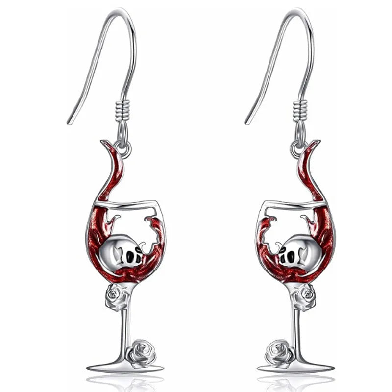 Silver tone zinc alloy Halloween earrings with a combined skull and wine glass geometry design.