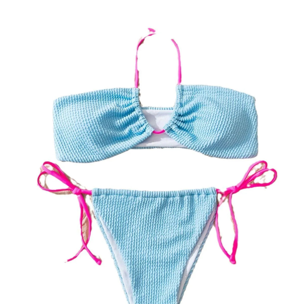 Solid colour women's two-piece swimsuit with lace-up halter top and briefs.