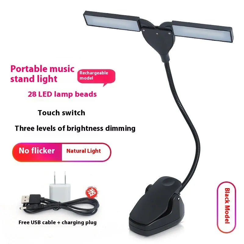 Black rechargeable music stand lamp with 28 LED bulbs lit up on a music stand.